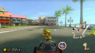 Golden Mario evading a blue shell in Mario Kart 8 Deluxe