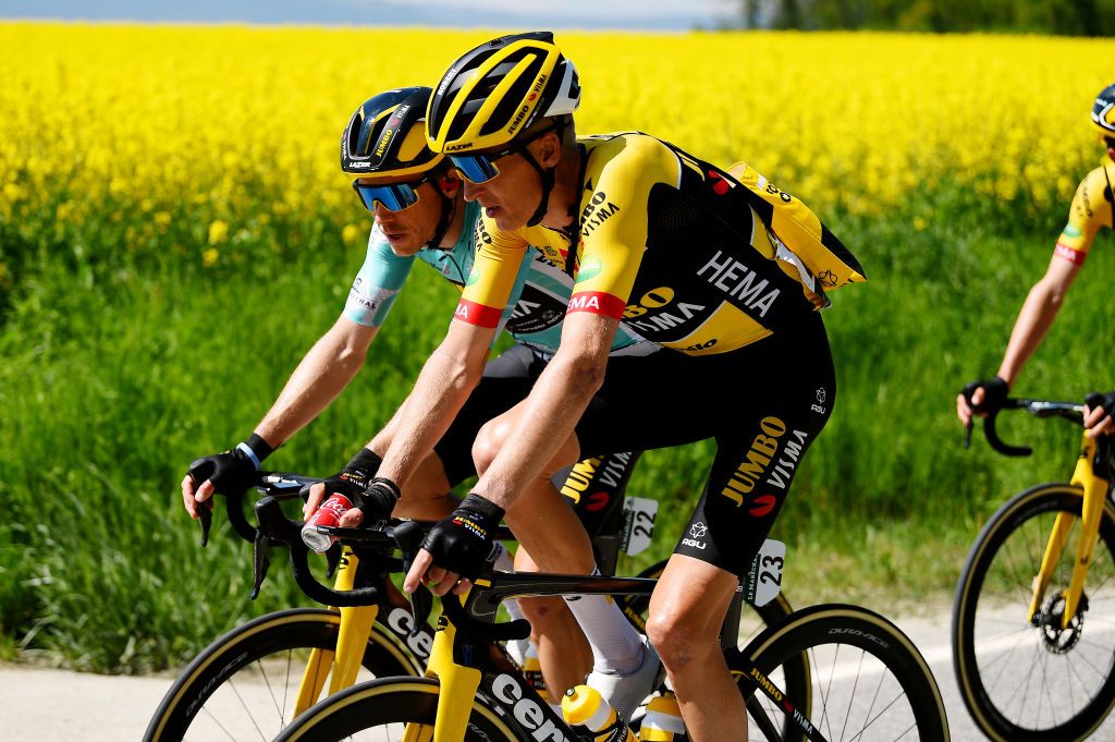 OULENSSOUSECHALLENS SWITZERLAND APRIL 28 Rohan Dennis of Australia turquoise leader jersey and Robert Gesink of Netherlands and Team Jumbo Visma compete during the 75th Tour De Romandie 2022 Stage 2 a 1682km stage from challens to challens TDR2022 on April 28 2022 in OulenssousEchallens Switzerland Photo by Dario BelingheriGetty Images