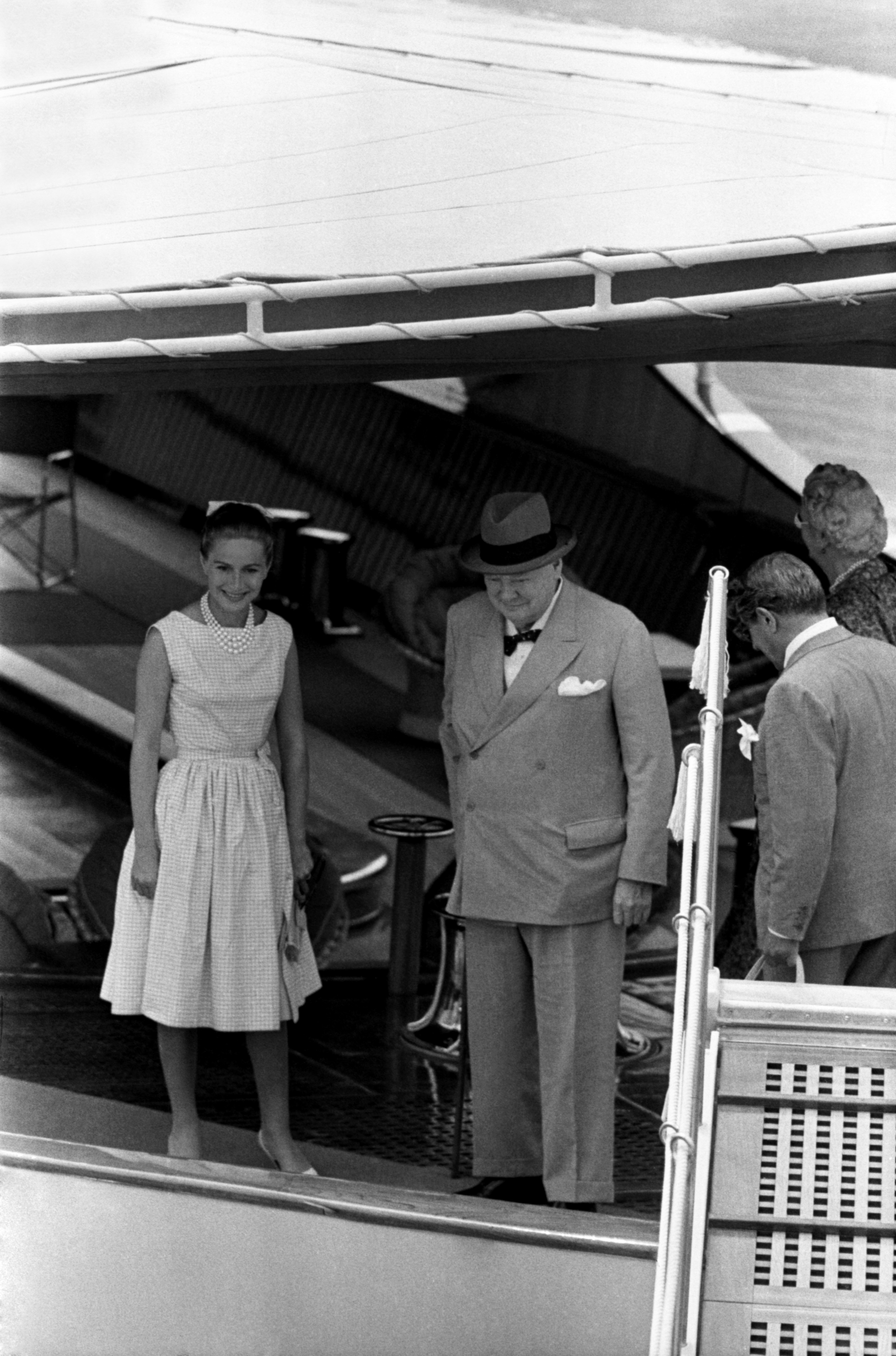 Christina Onassis (left), Aristotle Onassis (right) and Winston Churchil (centre) aboard the yacht Christina O in Monaco in 1959.