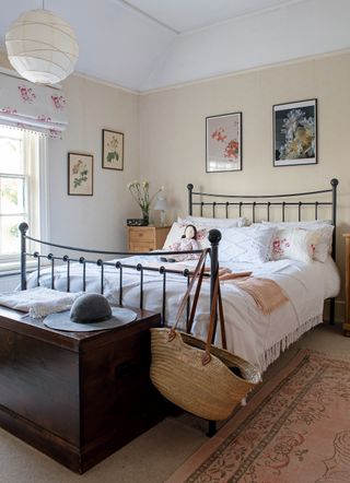 bedroom with cast iron bed in Georgian home