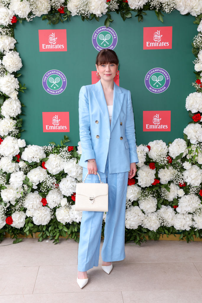 Jenny Walser attends Wimbledon in blue suit