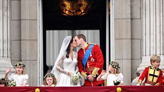 Prince William and Kate Middleton kiss on Buckingham Palace's balcony on their wedding day