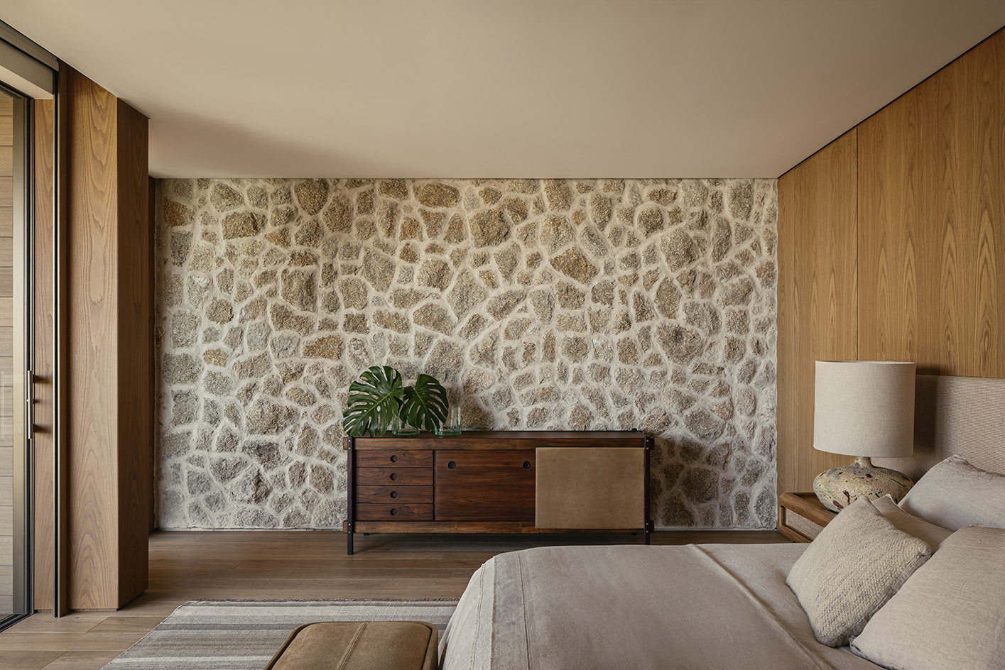 Bravissima House by Arthur Casas, a brazilian house nestled among the forest canopy and rising above the foliage to long views from large windows and ample terraces