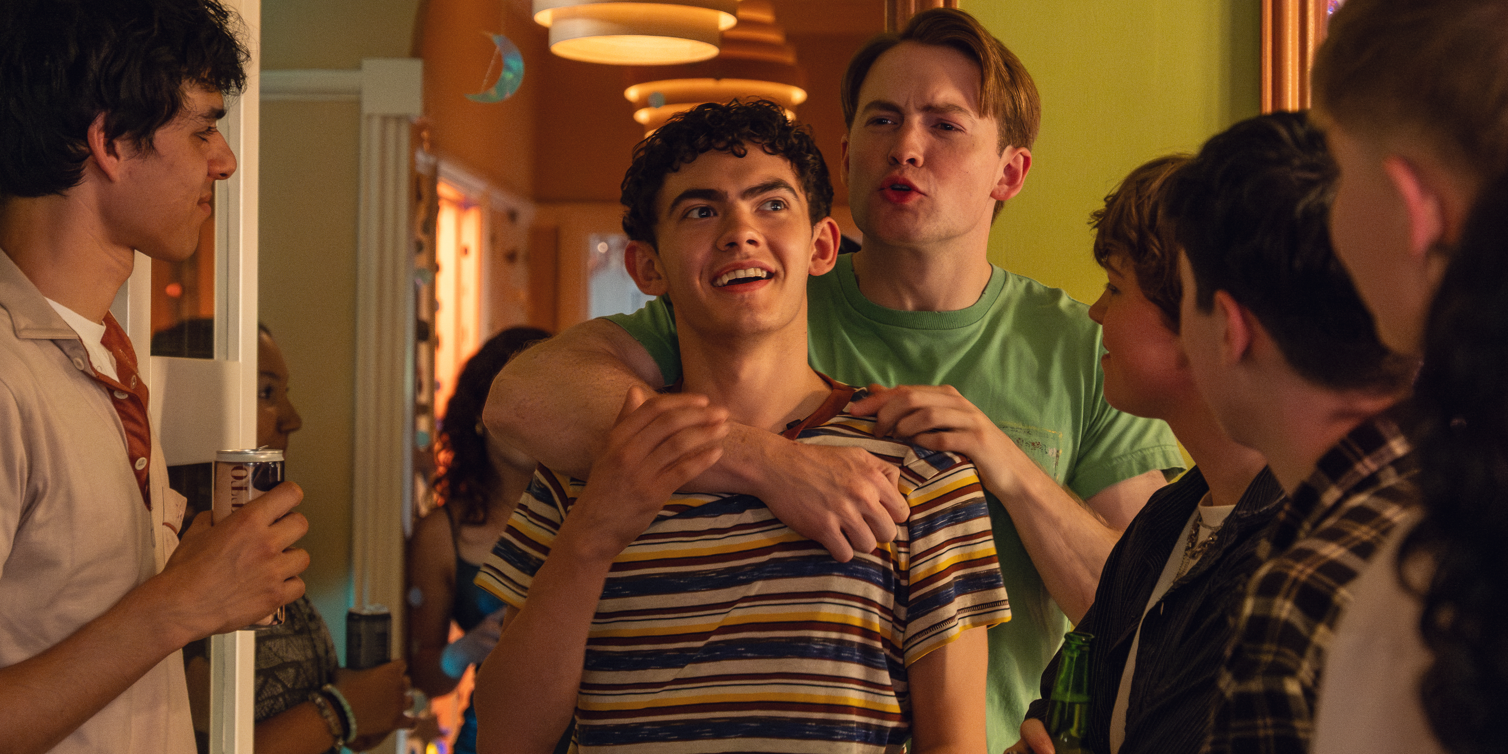 kit connor and joe locke walk into a house party together in heartstopper forever