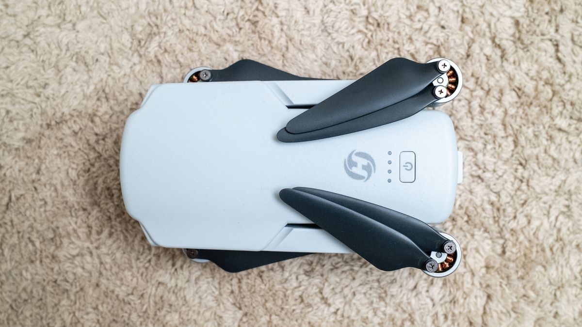 Holy Stone HS360E on a beige carpet