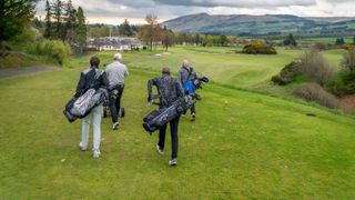 Golfers walking off the 18th tee at Gleneagles
