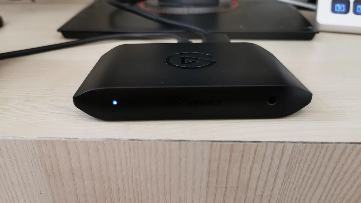 An Elgato capture card on a desk