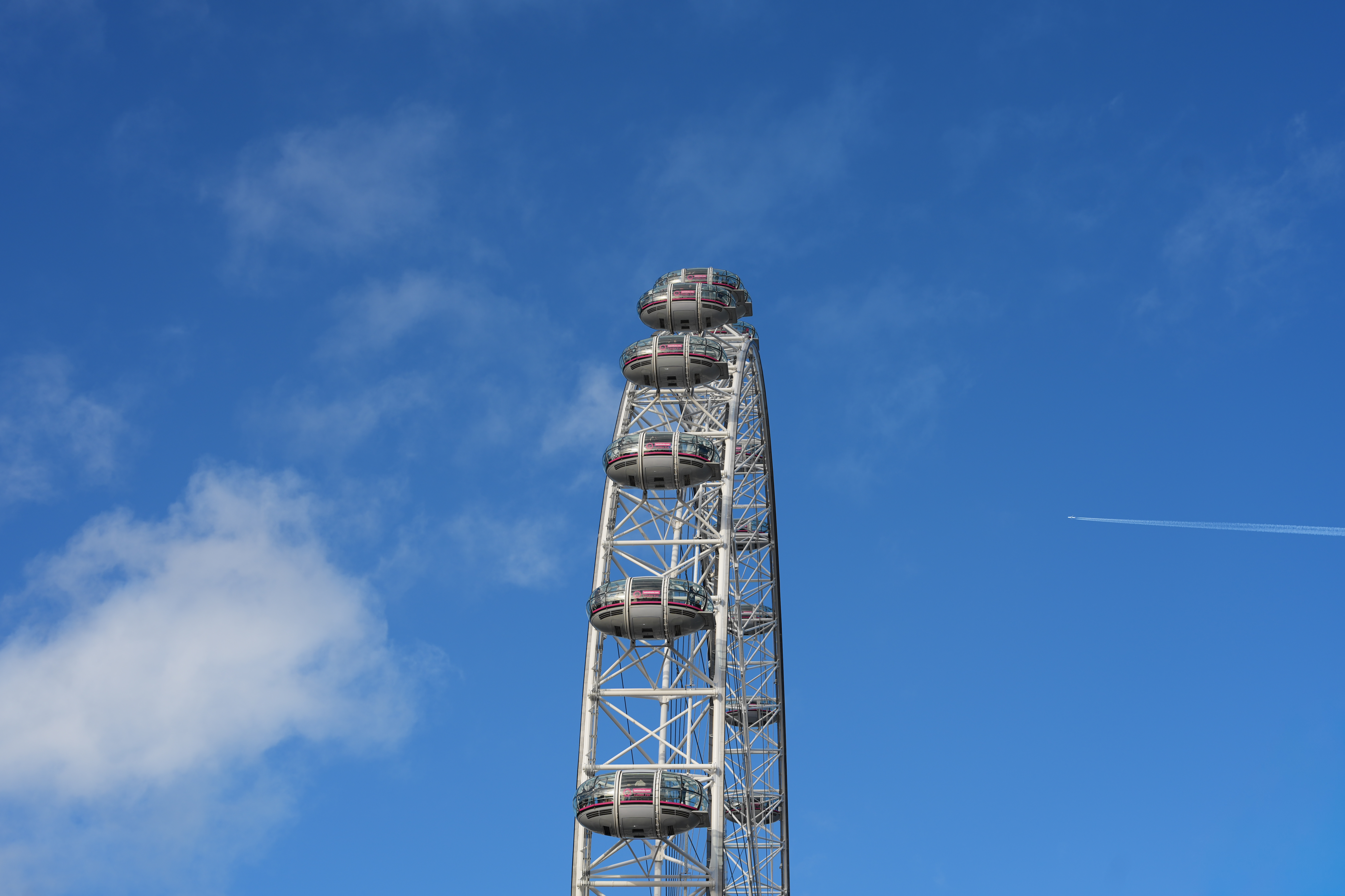 The London Eye set against a blue sky