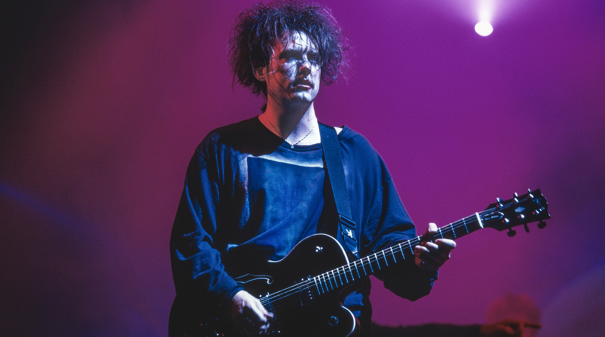 Robert Smith performs with the Cure at the Glastonbury Festival on Worthy Farm in Pilton, Somerset, England, 25th June 1995. 
