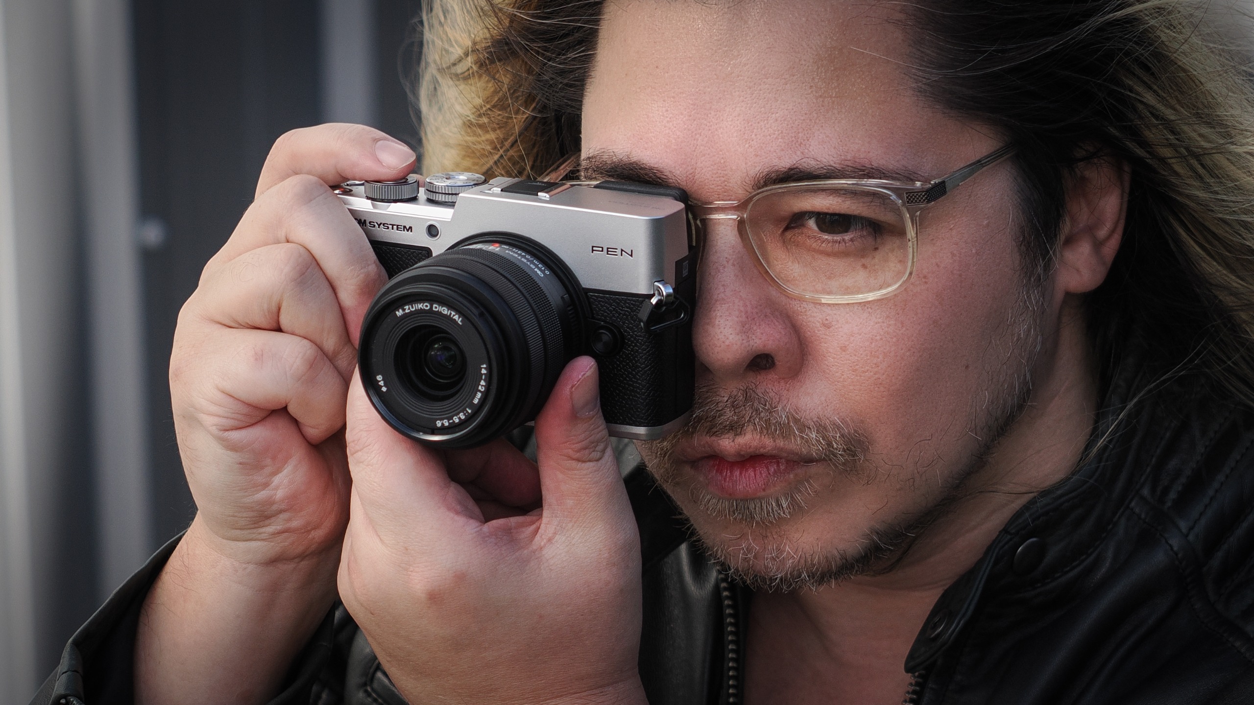 James Artaius shooting with the OM System PEN and the OM System M.Zuiko 14-42mm f/3.5-5.6 III in an urban setting