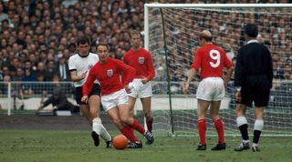 George Cohen playing for England in the 1966 World Cup final against West Germany at Wembley