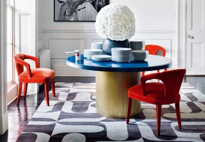 upholstered dining chairs around a modern round table