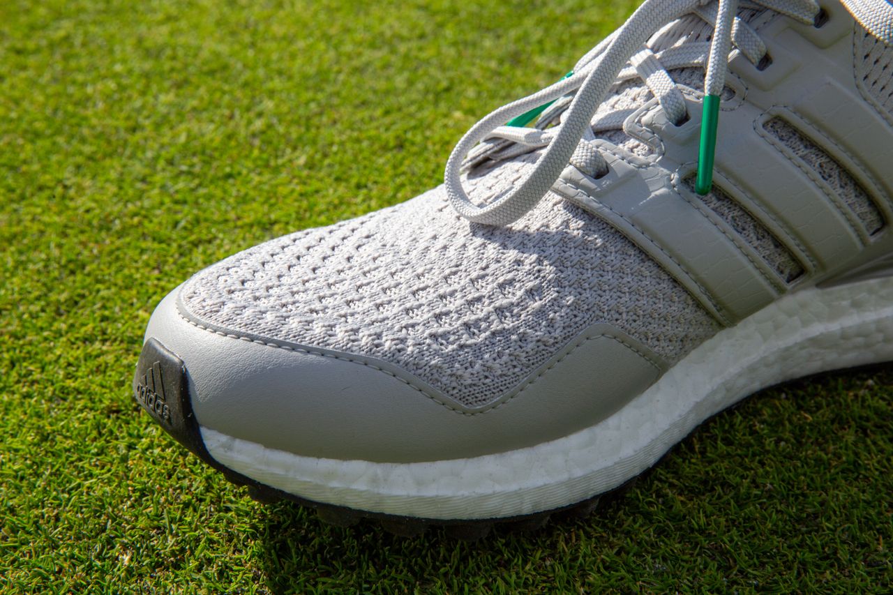 A close up of the Primeknit upper on the Adisas Ultraboost golf shoe