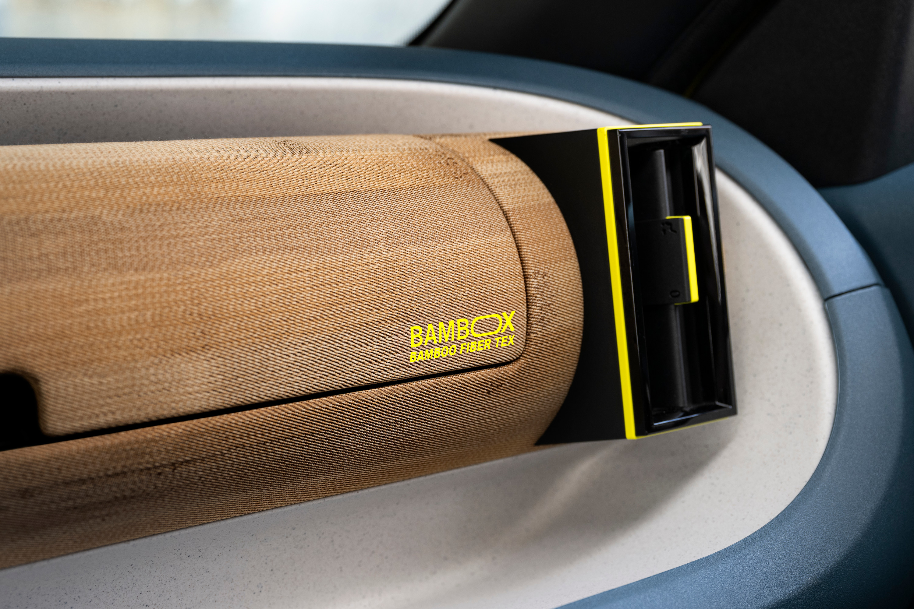The glovebox is clad in material formed from Bamboo fibre
