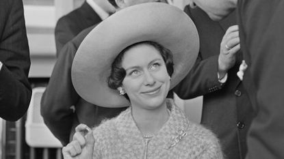 Princess Margaret’s unexpected reaction explained. Seen here visiting the Royal Asscher Diamond Company in Amsterdam,