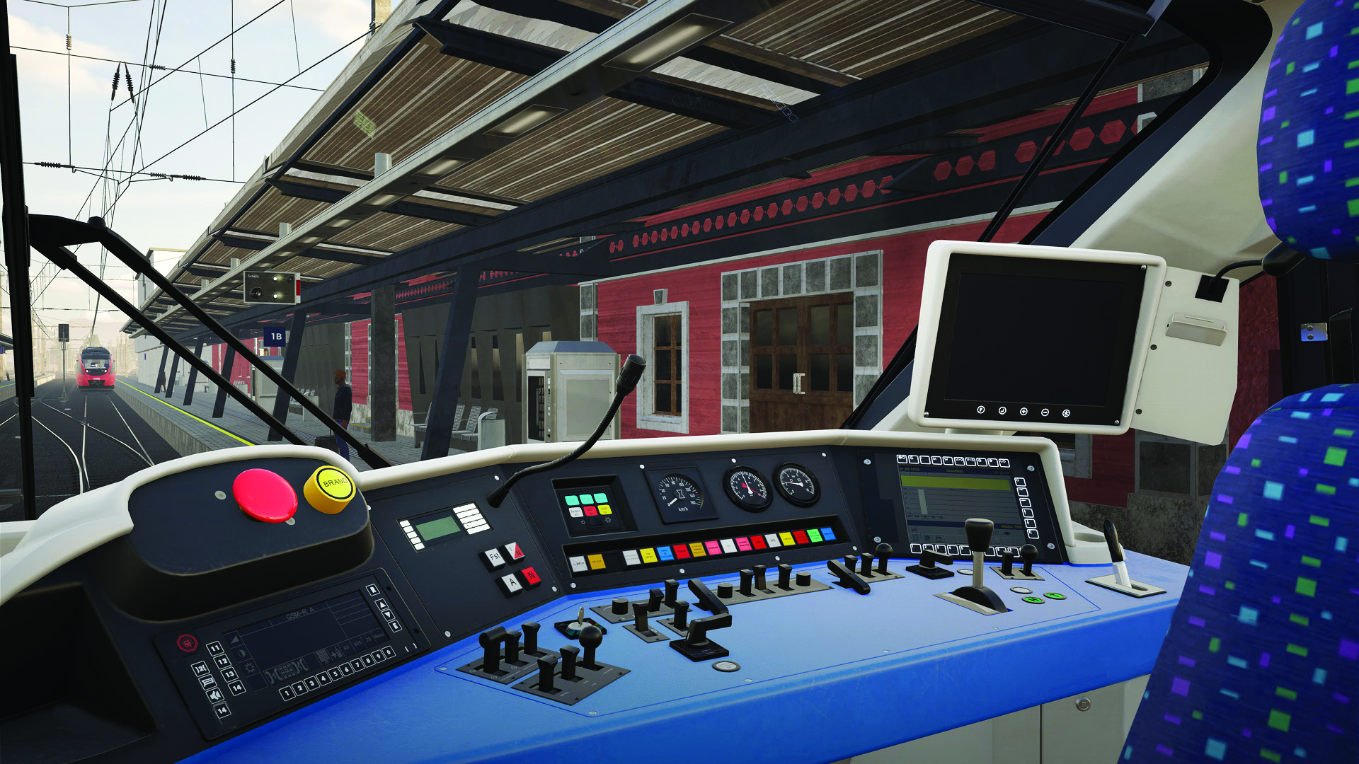 The inside of train cab with all the controls on display.