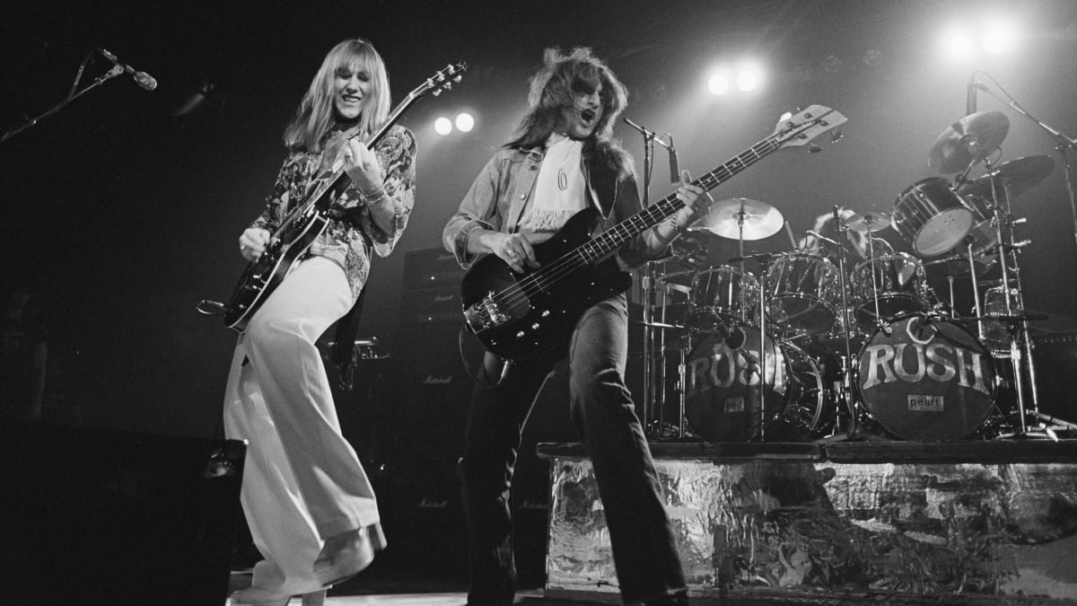Rush performing with Canadian progressive rock group, Rush, at the Civic Center in Springfield, Massachusetts, December 1976.