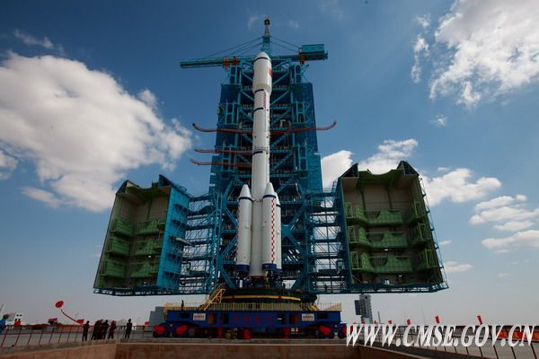 China&#039;s Tiangong 1 spacecraft and Long March 2F rocket is pictured at the launch site after being transferred from a facility at the Jiuquan Satellite Launching Center.