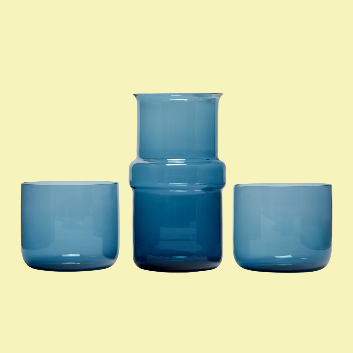 A blue Murano glass carafe and set of cups