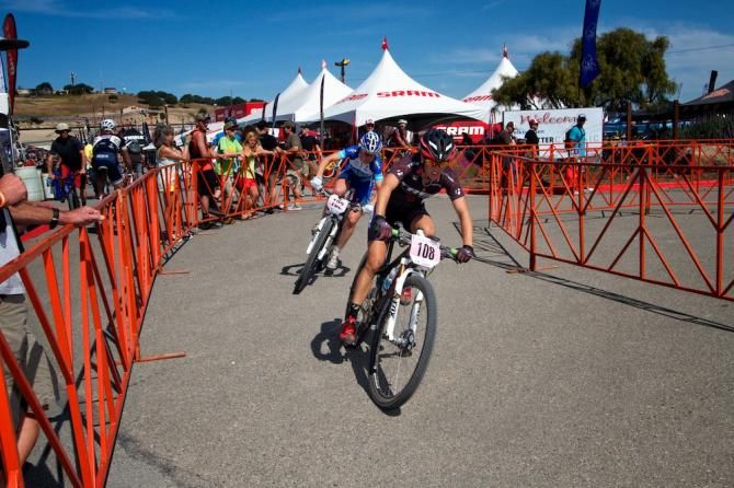 Rebecca Henderson (Trek Factory Racing) leading Georgia Gould (Luna Chix) though a final turn, with Gould taking the sprint for 5th.