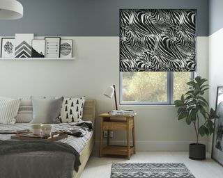 Zebra print roller blinds in bedroom by 247 Blinds