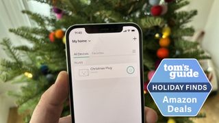 Kasa Smart Plug deal with Kasa app and christmas tree in the background