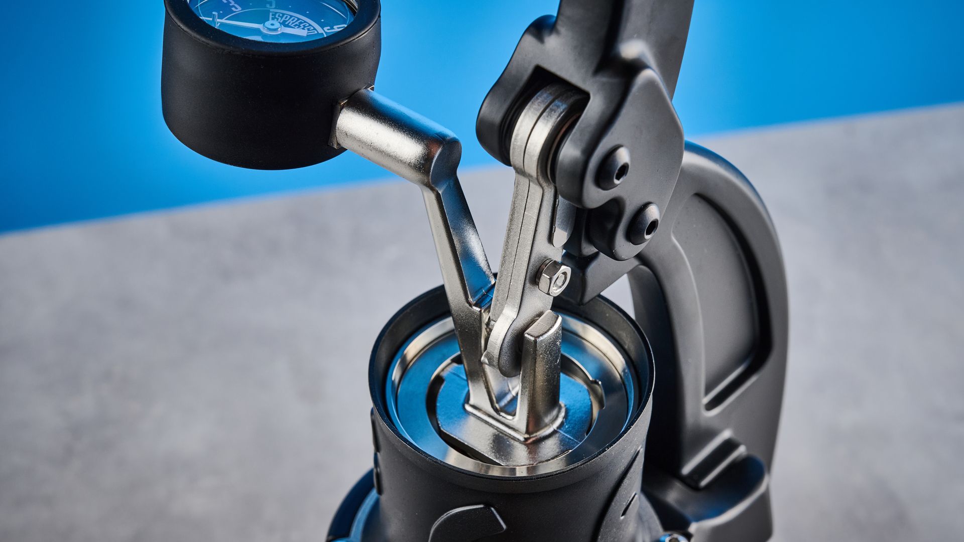 the flair 49 pro lever espresso machine photographed against the blue tom's guide background