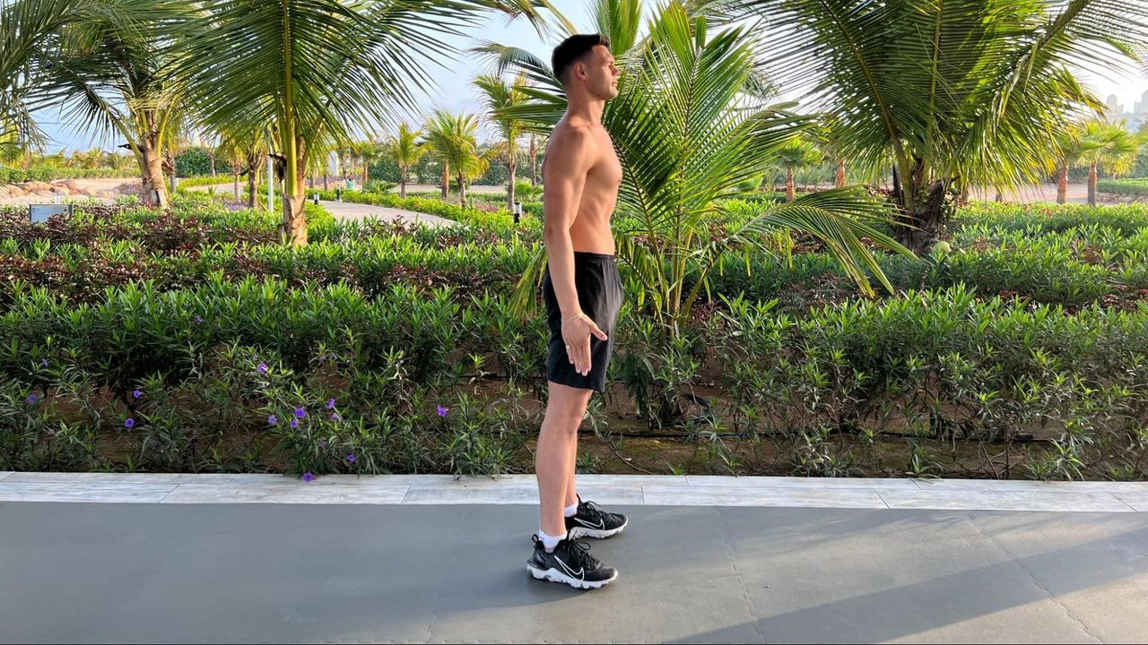 Sam Shaw in a standing position