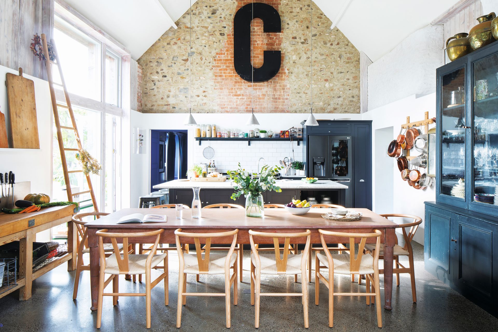 Black cabinet, wooden table, ladder