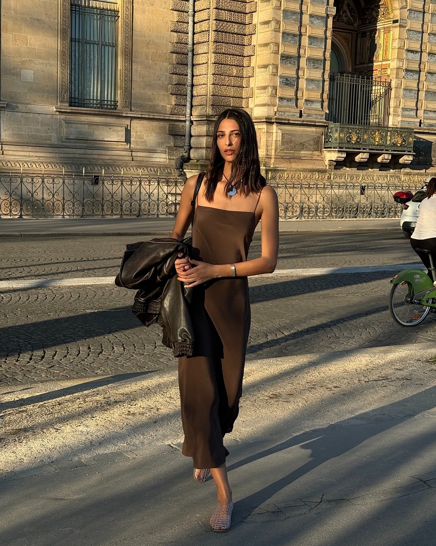 French influencer wearing a silky slip dress