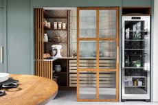 modern pantry with glass doors