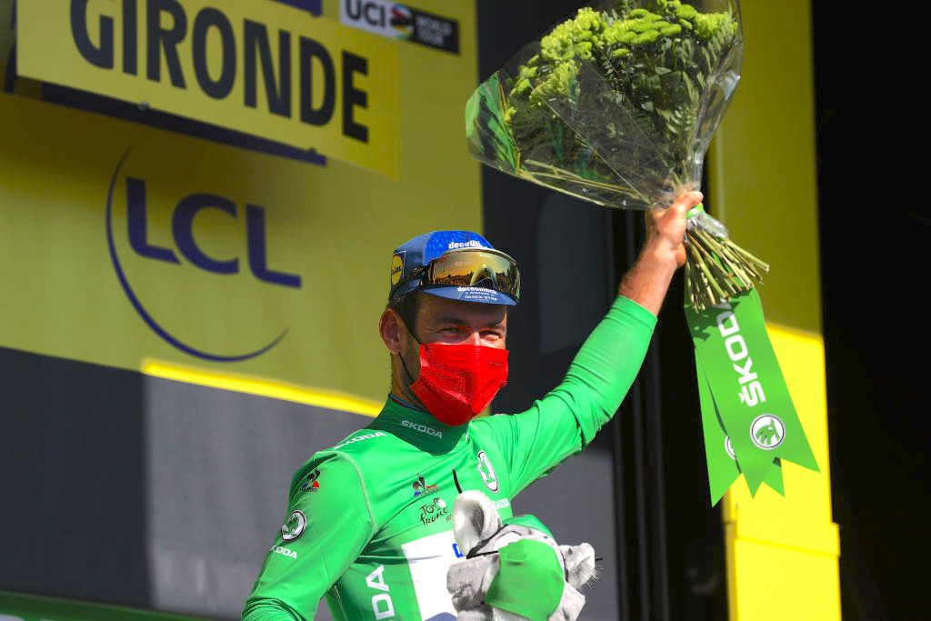 SAINT-EMILION, FRANCE - JULY 17: Mark Cavendish of The United Kingdom and Team Deceuninck - Quick-Step Green Points Jersey celebrates at podium during the 108th Tour de France 2021, Stage 20 a 30,8km Individual Time Trial Stage from Libourne to Saint-Emilion 75m / Mascot / ITT / @LeTour / #TDF2021 / on July 17, 2021 in Saint-Emilion, France. (Photo by Michael Steele/Getty Images)