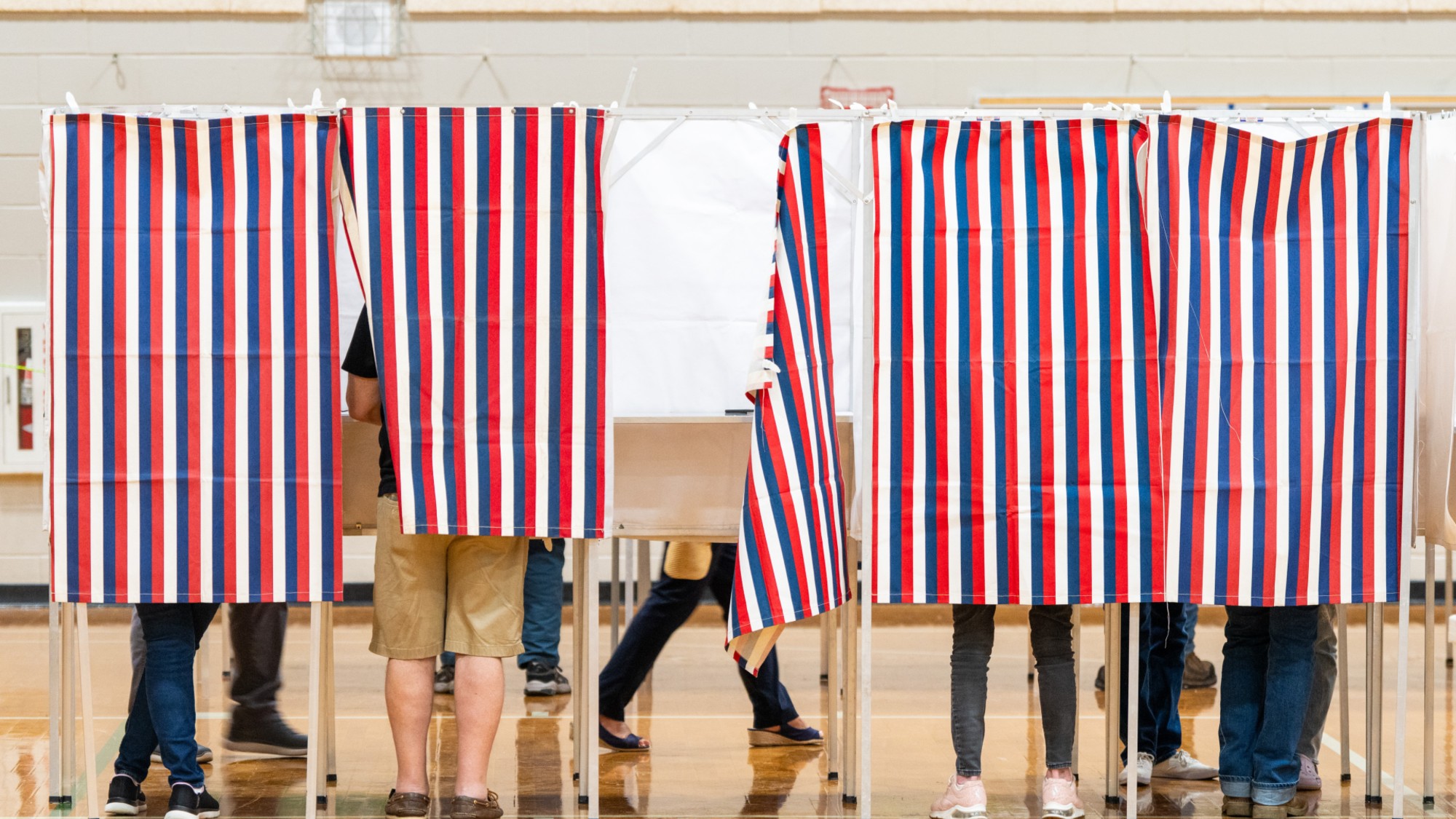 Democratic Senate Seat At Risk In New Hampshire As Sununu Gains Voters cast their ballots at a polling location inside David R. Cawley Middle School during a primary election in Hooksett, New Hampshire