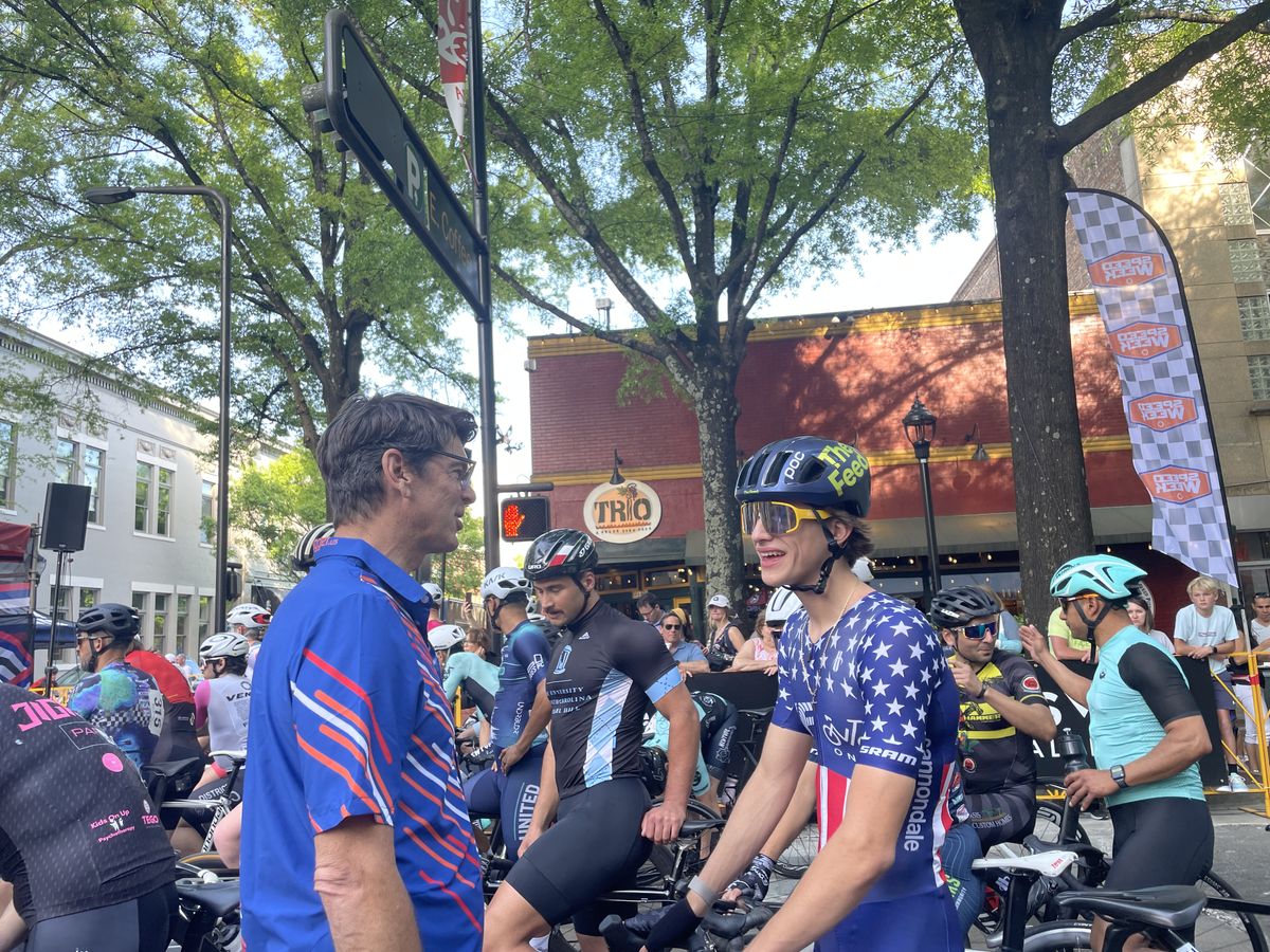 USA Speed Week announcer and Tour de France veteran Frankie Andreu talks with Enzo Hincapie at the Greenville Cycling Classic