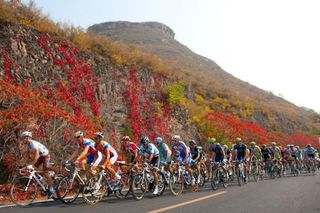 Rabobank and AG2R lead the bunch on one of the early climbs