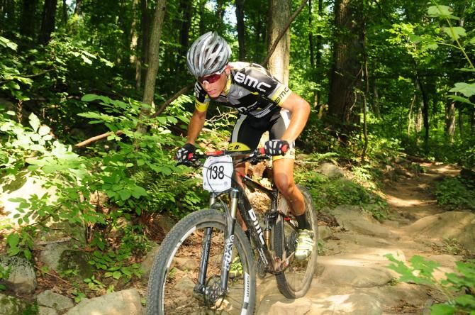 Kyle Bloesser (BMC Development Team) riding descending on singletrack