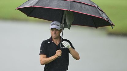 Justin Thomas in the rain at the Wyndham Championship