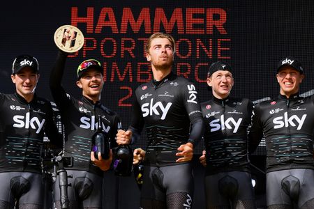 A smiling Team Sky on the podium