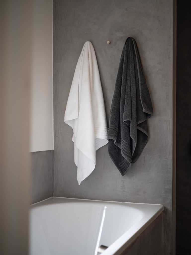 4 best ways to hang bathroom towels to maximize your space | Livingetc