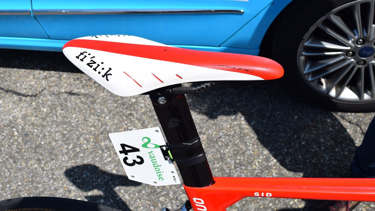 The bike is topped with a colour-coordinated Fizik Arione saddle