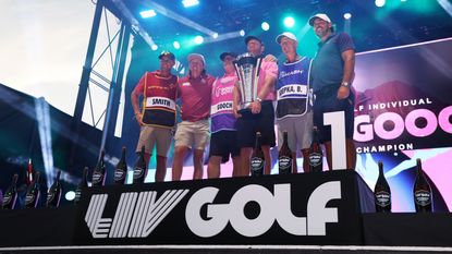 Talor Gooch of RangeGoats GC, Captain Cameron Smith of Ripper GC and Captain Brooks Koepka of Smash GC celebrate on stage for individual first, second and third places during Day Three of the LIV Golf Invitational - Miami Team Championship