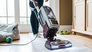 Shark Professional vacuum cleaning a carpet