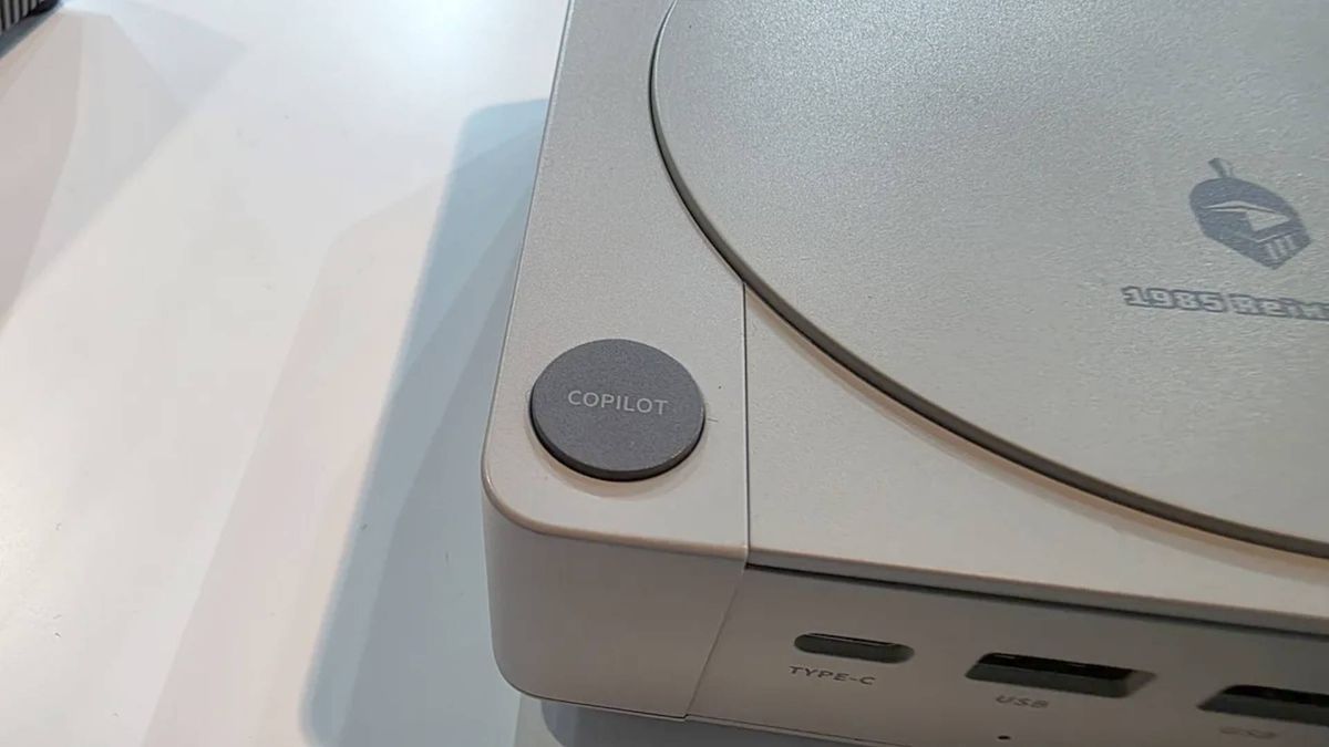 Close up of Acemagic Retro mini PC Copilot button.