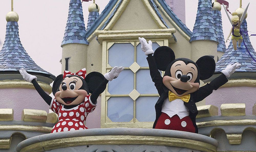 Mickey Mouse and Minnie Mouse perform during a parade at Hong Kong Disneyland on Sept. 11, 2005.