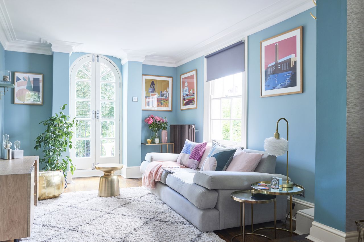 blue living room with grey sofa