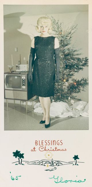 Christmas card from Gloria in a black dress