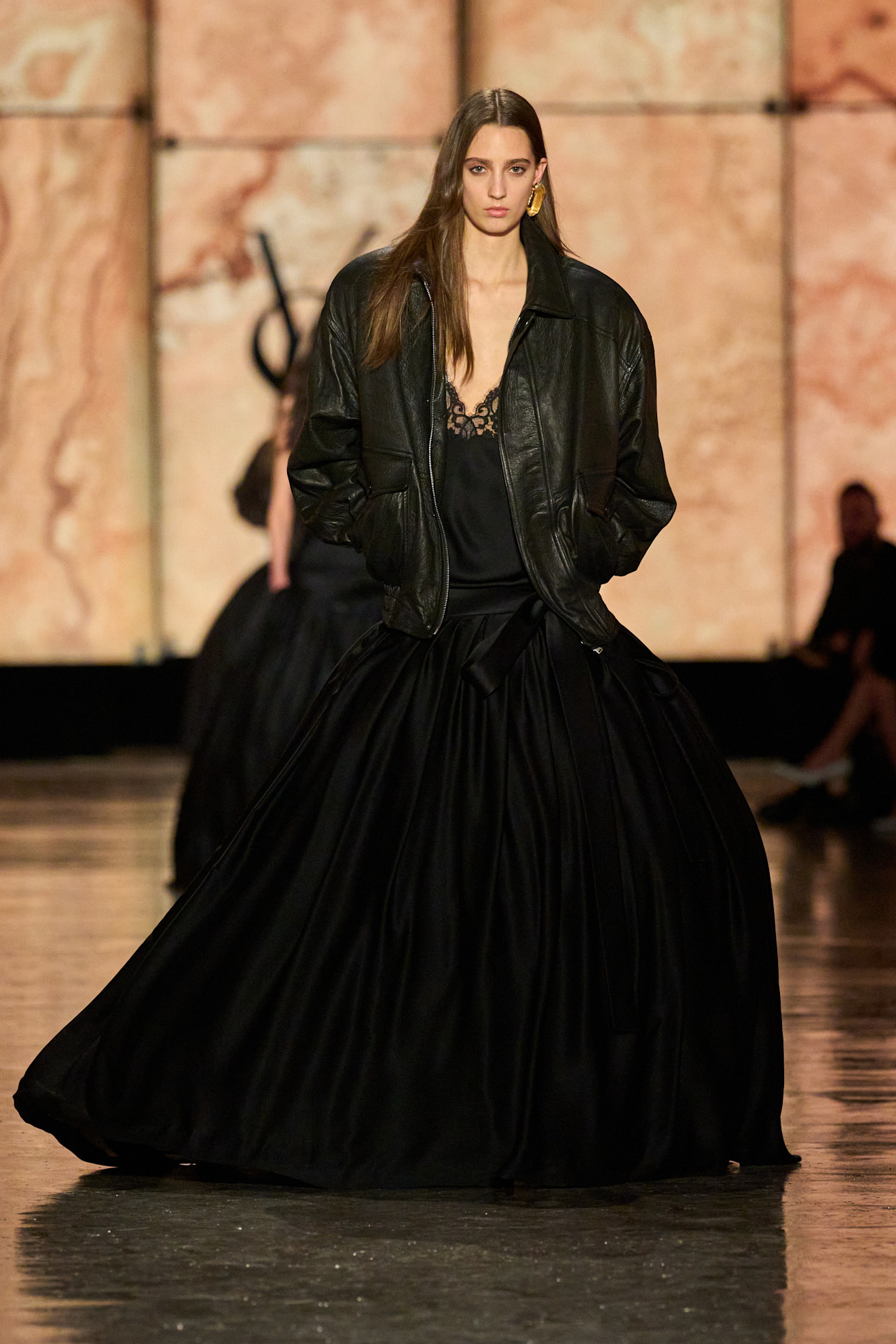 A model wore Rihanna's Saint Laurent look on the Fall 2025 runway.