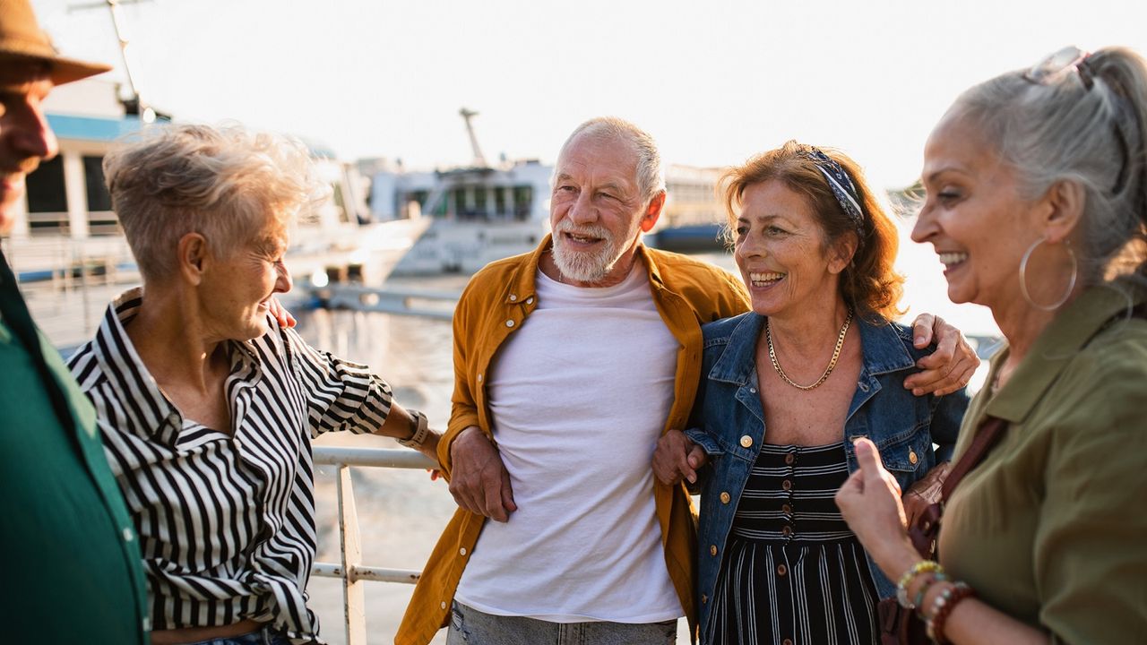 A senior couple spends time with friends.