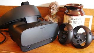 Oculus Rift S headset and controllers on a desk