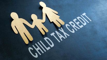picture of a cut-out family next to the words "child tax credit"